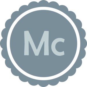 A Midheaven badge with the text, "Mc" on a blue background badge. Mc is the symbol for midheaven, short for Medium Coeli